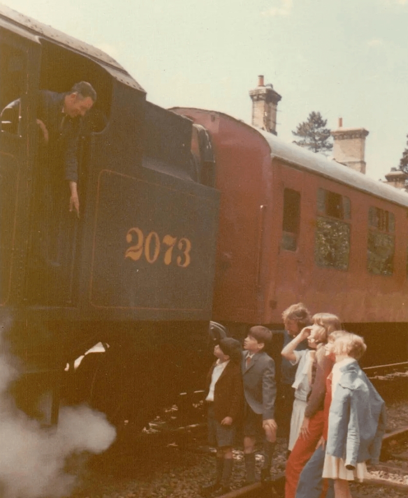 Talking to the engine driver at the Haverthwaite Railway Station on the first day of filming 'Swallows and Amazons' in 1973 (Photo: Daphne Neville)