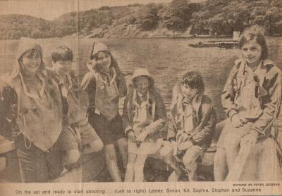 newspaper cutting of cast in life jackets