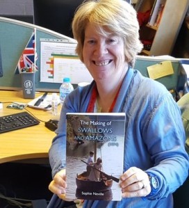 Prize winner with her copy of 'The Making of Swallows and Amazons'